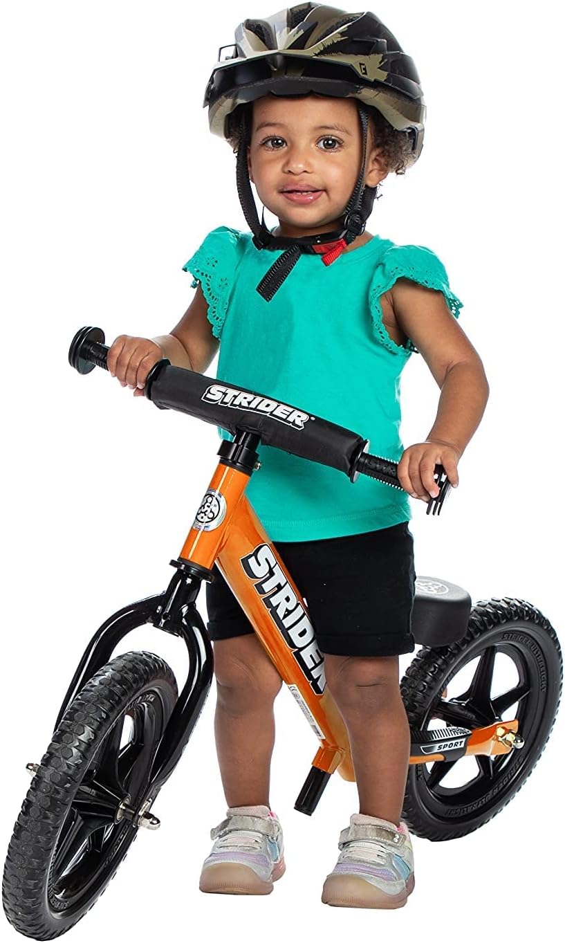 Strider 12' Sport Bike - No Pedal Balance Bicycle for Kids 1 to 4 Years - Includes Safety Pad, Padded Seat, Mini Grips & Flat-Free Tires - Tool-Free Assembly & Adjustments