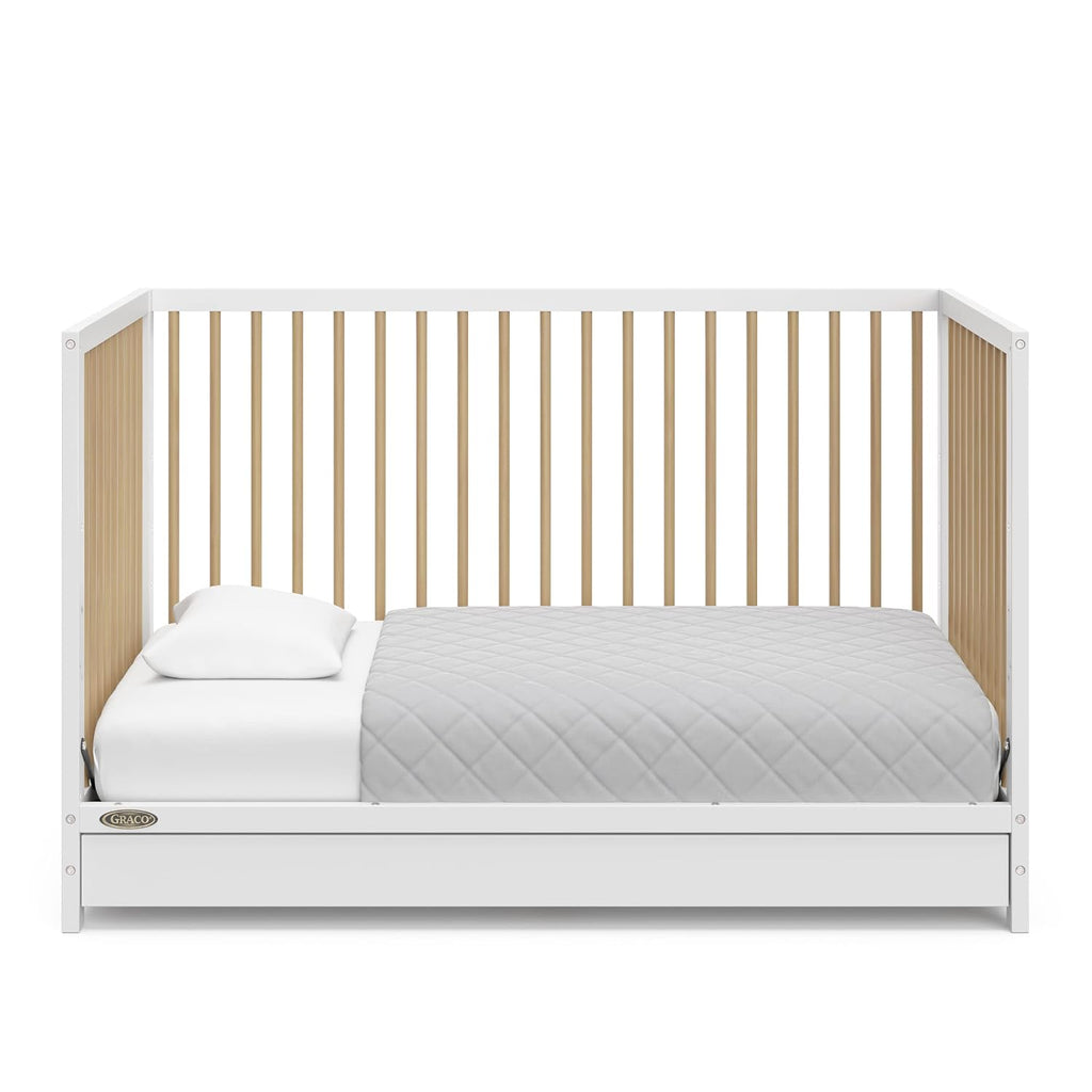 Graco Teddi 5-in-1 Convertible Crib with Drawer – GREENGUARD Gold Certified, Full-Size Nursery Storage Drawer, Baby Crib Converts to Toddler Bed, Daybed and Full-Size Bed (White and Driftwood)