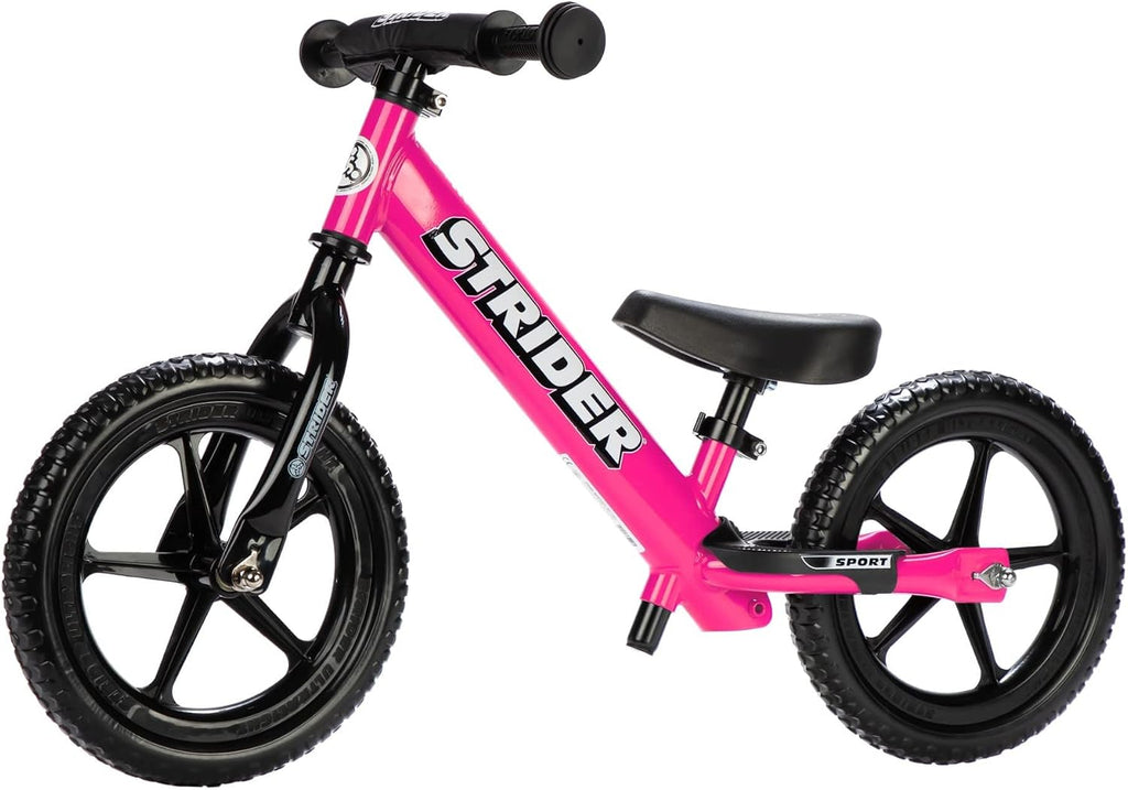 Strider 12' Sport Bike - No Pedal Balance Bicycle for Kids 1 to 4 Years - Includes Safety Pad, Padded Seat, Mini Grips & Flat-Free Tires - Tool-Free Assembly & Adjustments