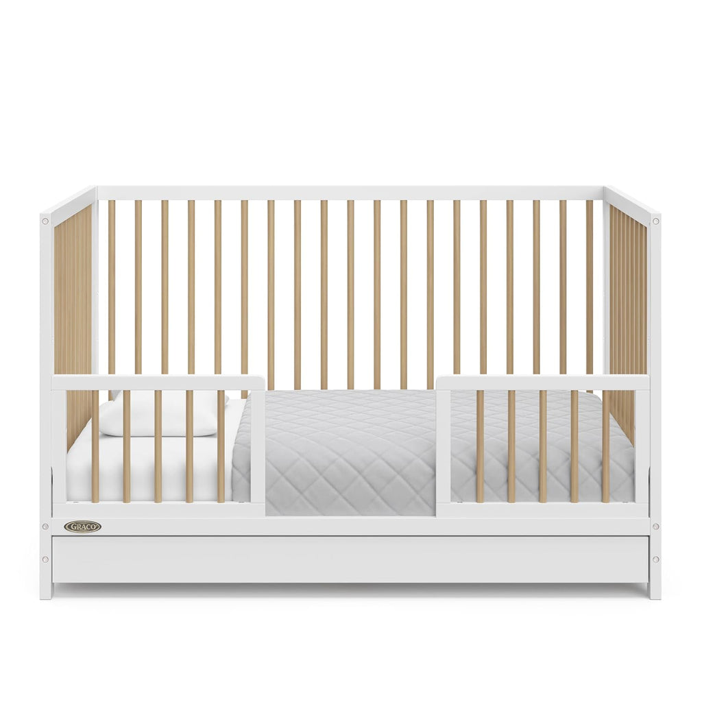 Graco Teddi 5-in-1 Convertible Crib with Drawer – GREENGUARD Gold Certified, Full-Size Nursery Storage Drawer, Baby Crib Converts to Toddler Bed, Daybed and Full-Size Bed (White and Driftwood)