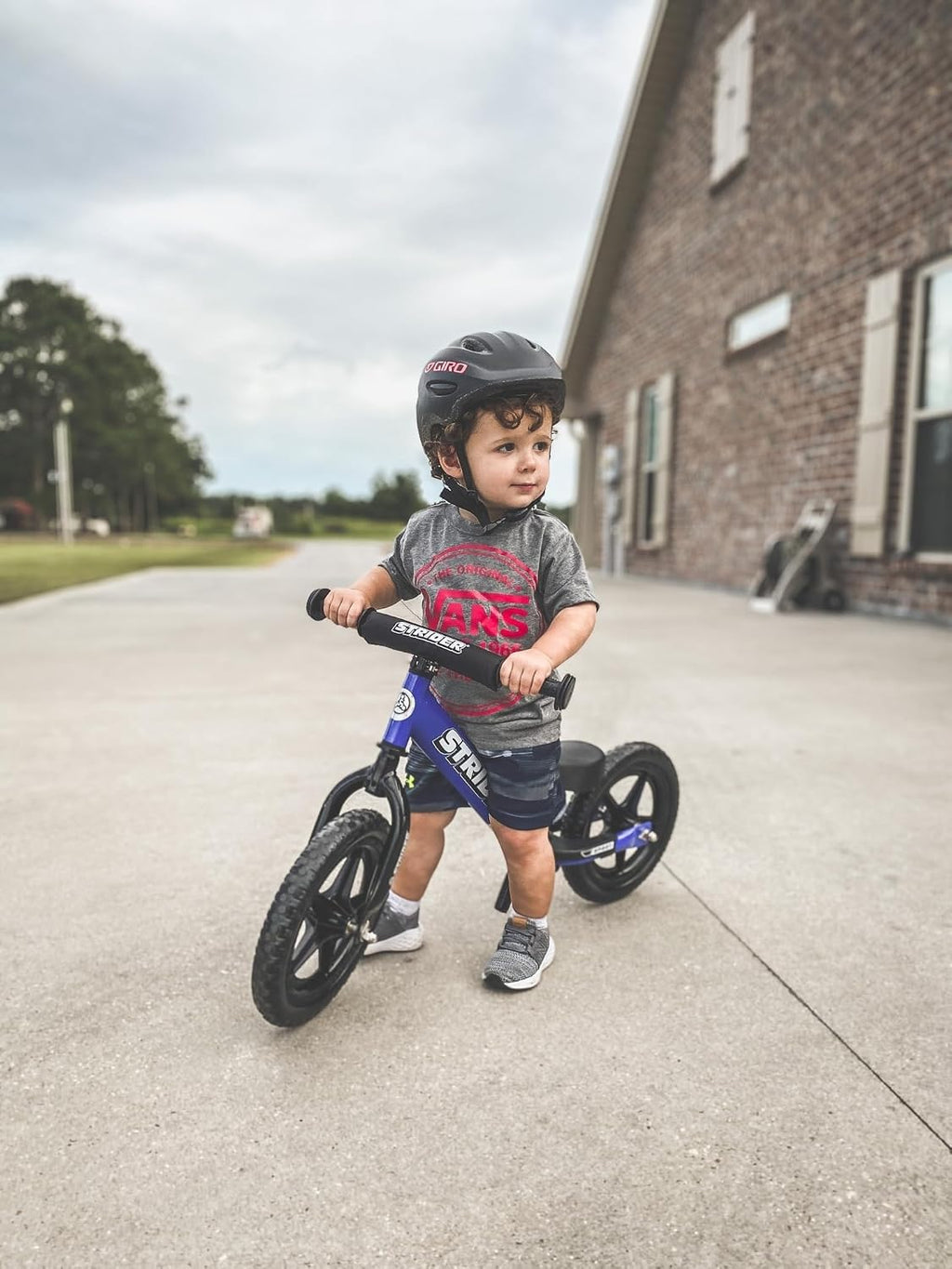 Strider 12' Sport Bike - No Pedal Balance Bicycle for Kids 1 to 4 Years - Includes Safety Pad, Padded Seat, Mini Grips & Flat-Free Tires - Tool-Free Assembly & Adjustments