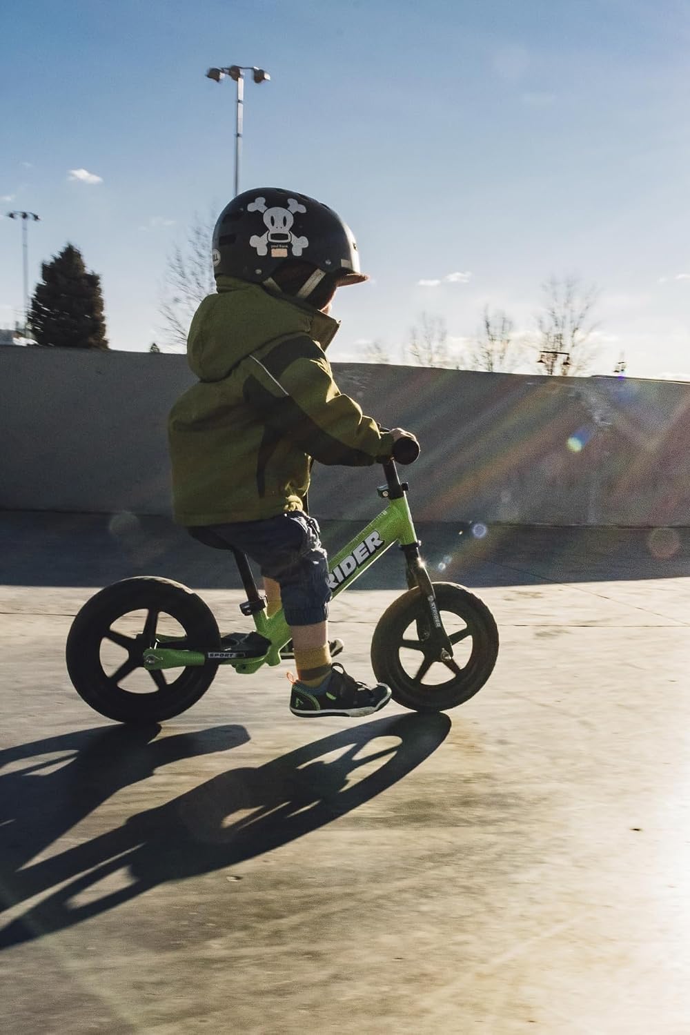 Strider 12' Sport Bike - No Pedal Balance Bicycle for Kids 1 to 4 Years - Includes Safety Pad, Padded Seat, Mini Grips & Flat-Free Tires - Tool-Free Assembly & Adjustments