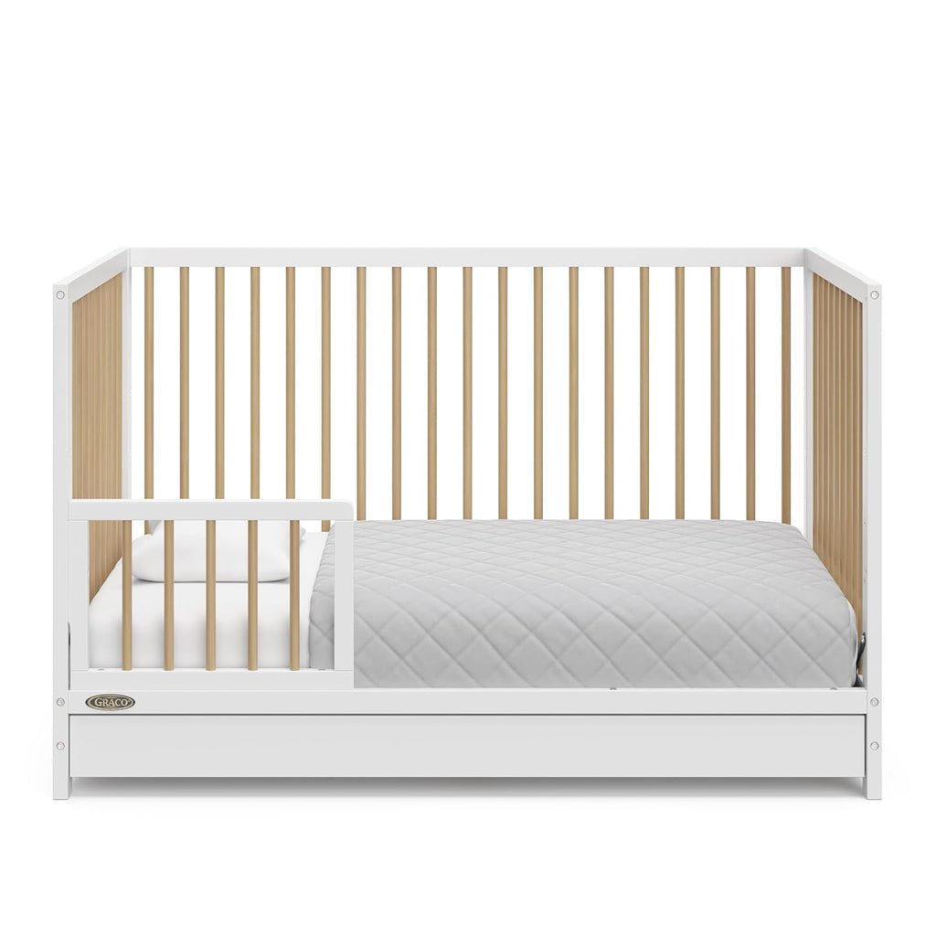 Graco Teddi 5-in-1 Convertible Crib with Drawer – GREENGUARD Gold Certified, Full-Size Nursery Storage Drawer, Baby Crib Converts to Toddler Bed, Daybed and Full-Size Bed (White and Driftwood)