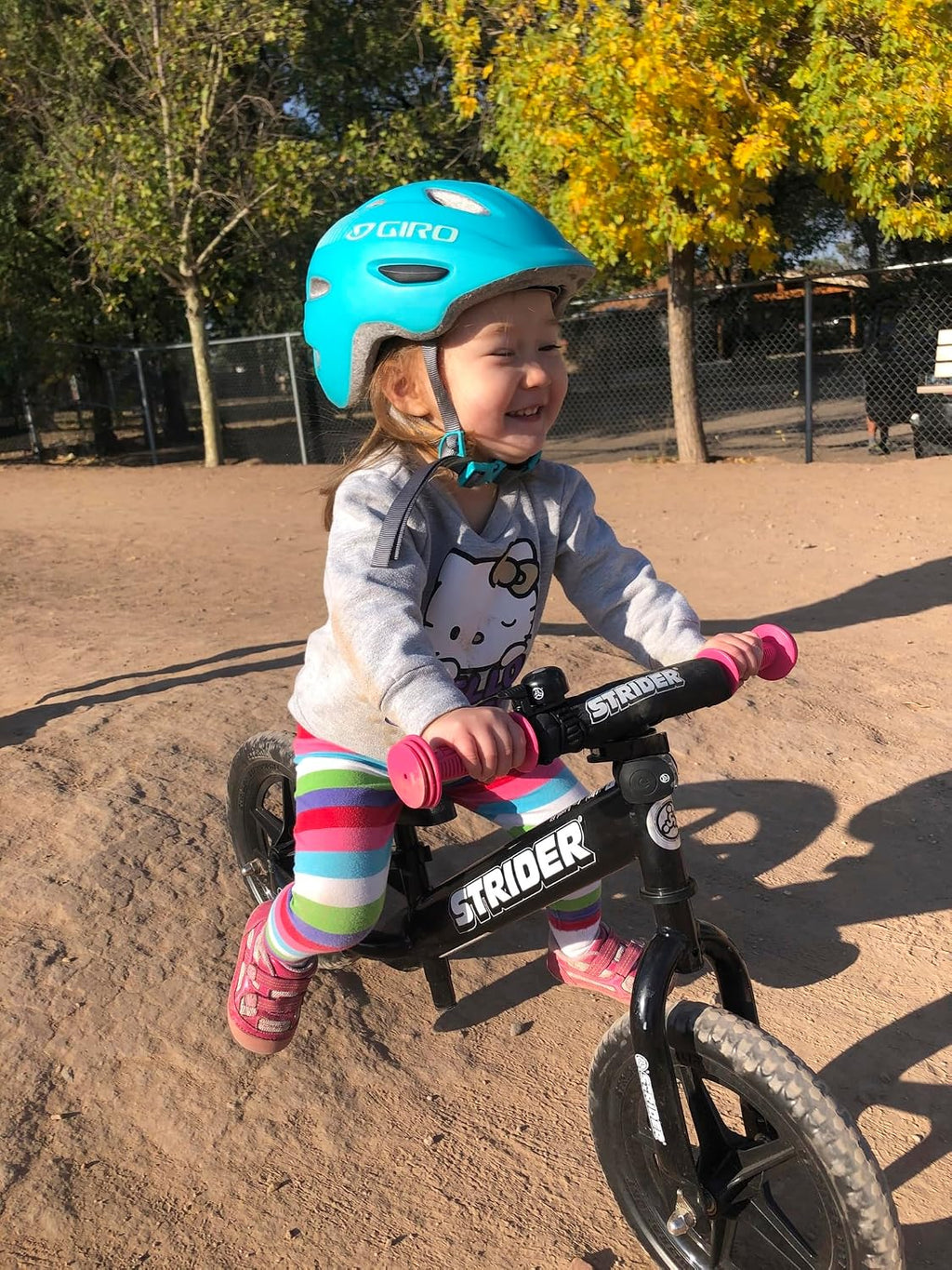 Strider 12' Sport Bike - No Pedal Balance Bicycle for Kids 1 to 4 Years - Includes Safety Pad, Padded Seat, Mini Grips & Flat-Free Tires - Tool-Free Assembly & Adjustments