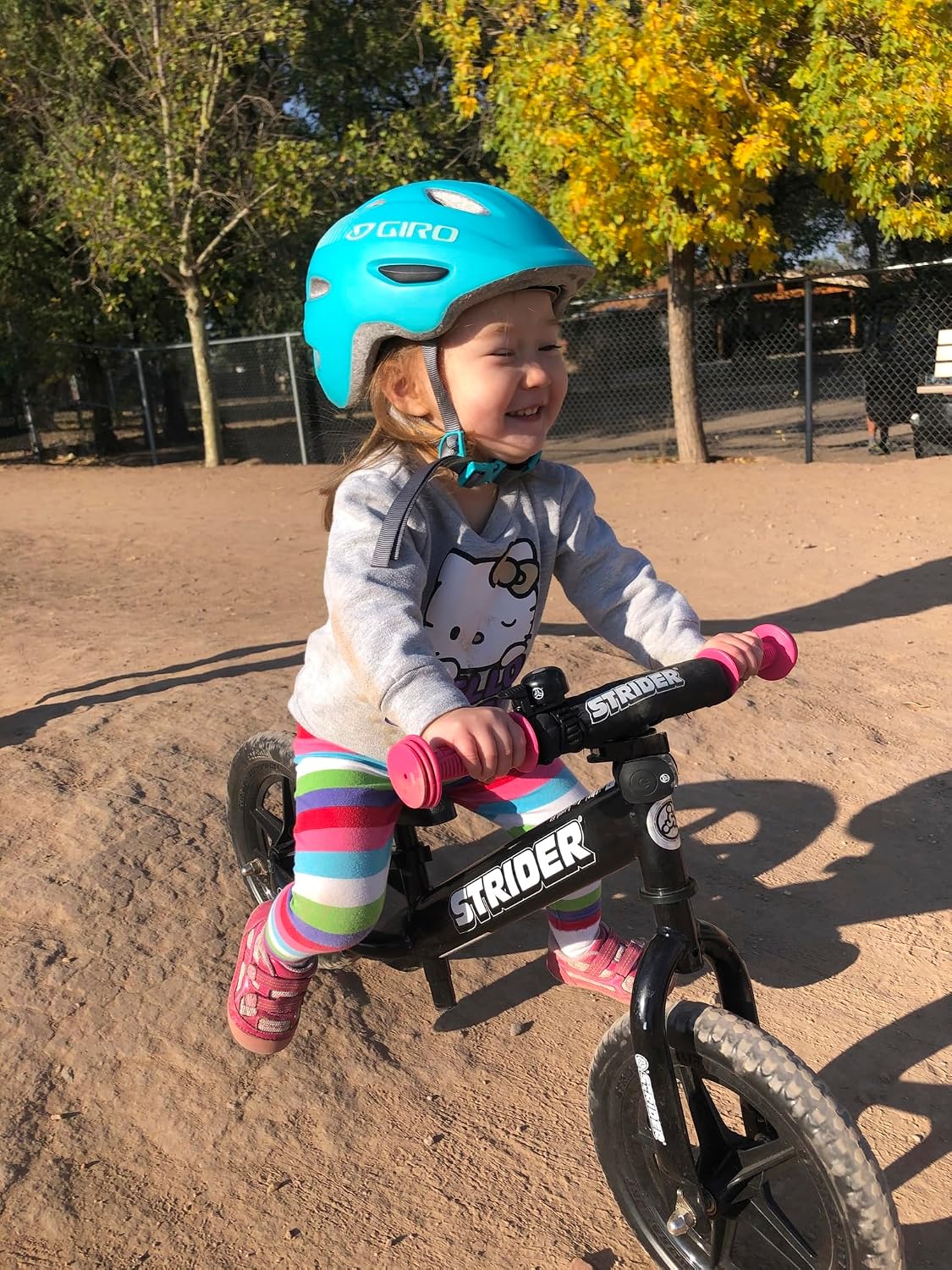 Strider 12' Sport Bike - No Pedal Balance Bicycle for Kids 1 to 4 Years - Includes Safety Pad, Padded Seat, Mini Grips & Flat-Free Tires - Tool-Free Assembly & Adjustments
