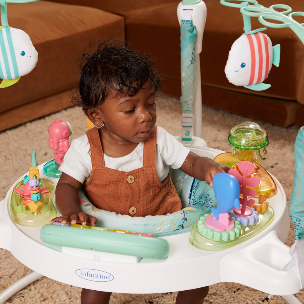 Infantino Magic Motion Activity Jumper, Under the Sea Baby Jumper with 360° Seat, Removable Piano, Lights & Music, Adjustable Height Activity Center, Motor Skills and Sensory Play, Ages 4+ Months