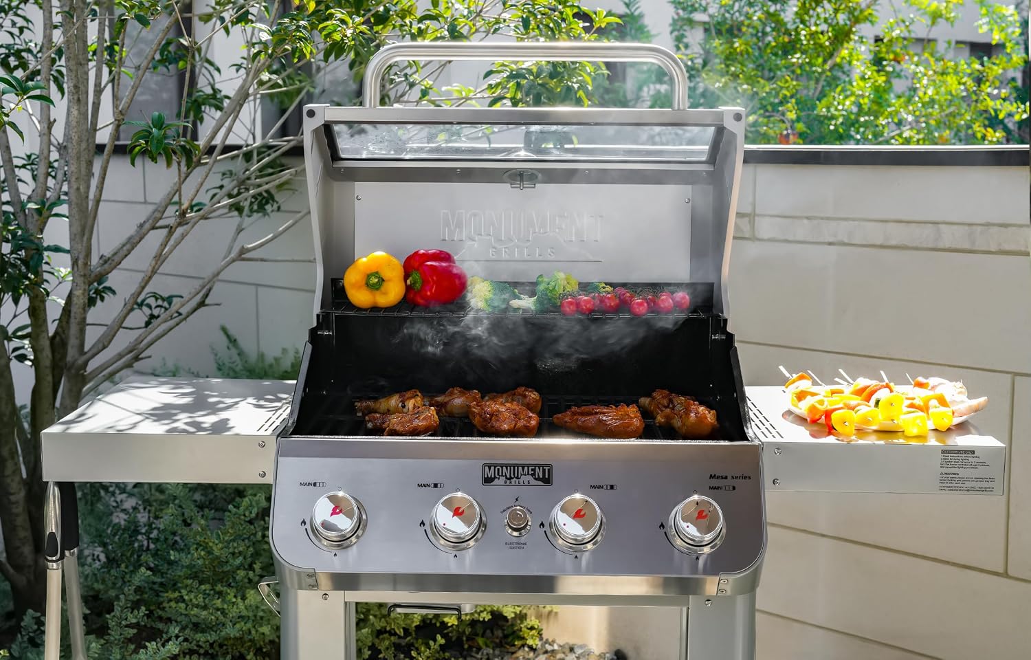 Monument Grills 4-Burner Liquid Propane Gas Grill, Silver Stainless Steel Grill Outdoor Patio Garden Barbecue Grill with Clearview® Lid and One Foldable Shelf, Mesa400MF