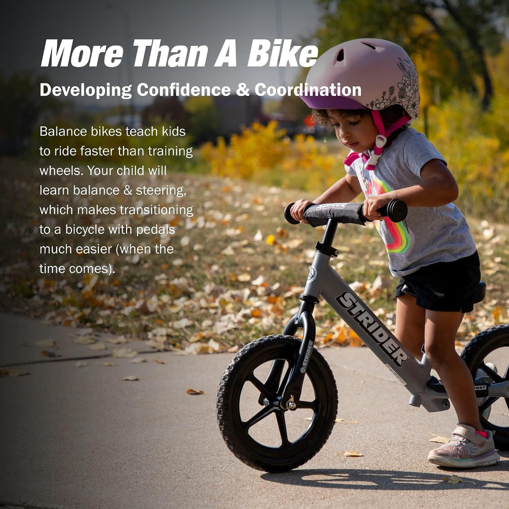 Strider 12' Sport Bike - No Pedal Balance Bicycle for Kids 1 to 4 Years - Includes Safety Pad, Padded Seat, Mini Grips & Flat-Free Tires - Tool-Free Assembly & Adjustments