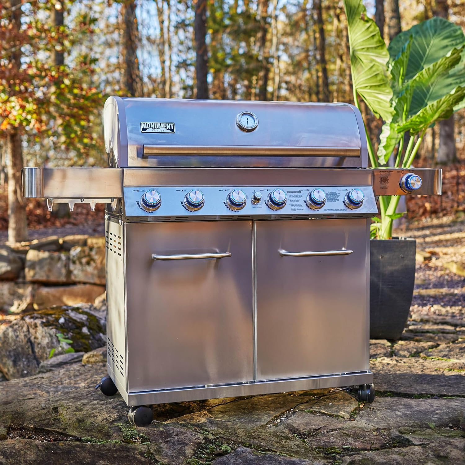 Monument Grills 6 Burner 640 sq.in. Stainless Steel Propane Gas Grill with a Rotisserie Kit, a Side Burner, a Built-In Thermometer, Large Cabinet Style Grill