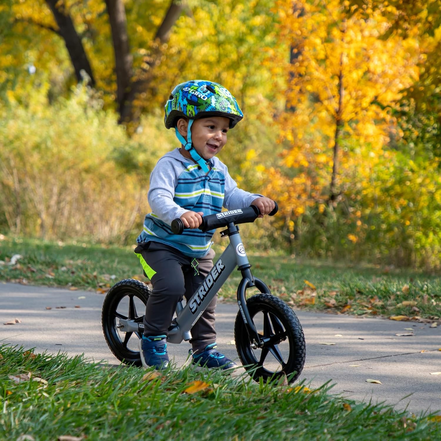 Strider 12' Sport Bike - No Pedal Balance Bicycle for Kids 1 to 4 Years - Includes Safety Pad, Padded Seat, Mini Grips & Flat-Free Tires - Tool-Free Assembly & Adjustments